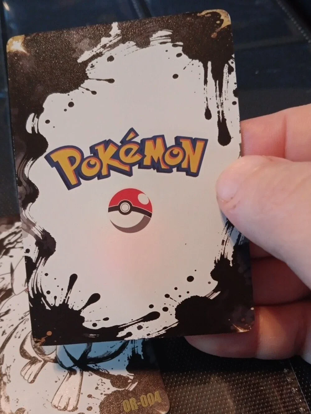 Pokemon Trading Card - White, Black, Blue, Gold Accent
